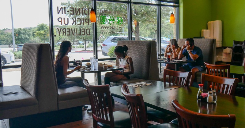 Interior, tables, chairs by the street window