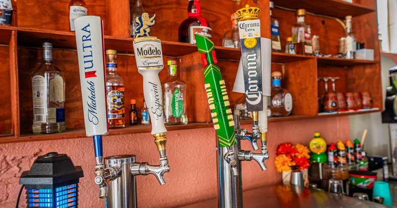 Beer tap handles behind the bar