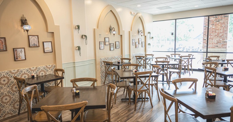 Interior, seating area with tables and chairs