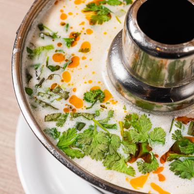 Thai coconut chicken soup, close-up.