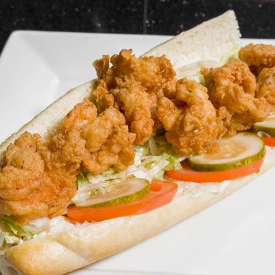 Close up shot of fried shrimp Po Boy.