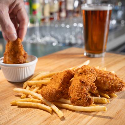 Crispy chicken tenders and fries.