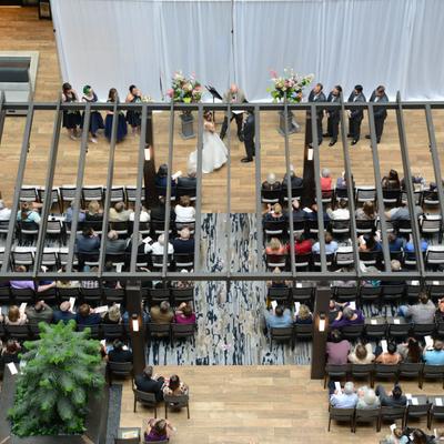 Wedding ceremony in progress in the indoor atrium, top view
