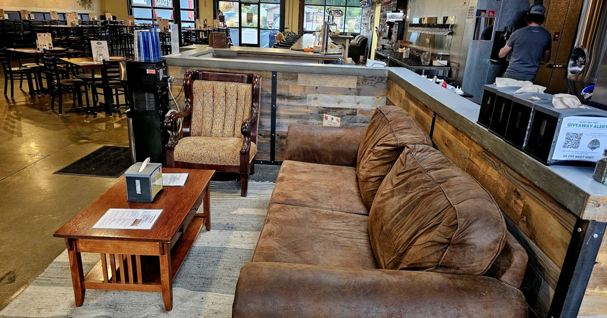 Lounge are with couches, comfy chairs, coffee table and side tables