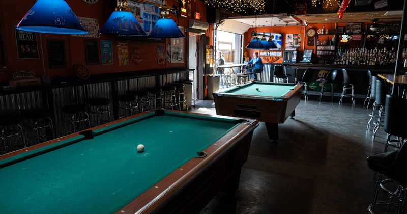 Interior, pool tables waiting for the guests