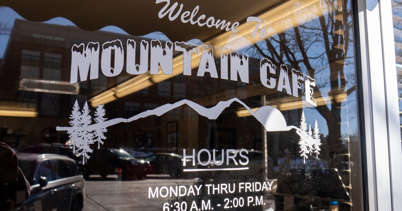 Welcome note on the front glass of restaurant entrance