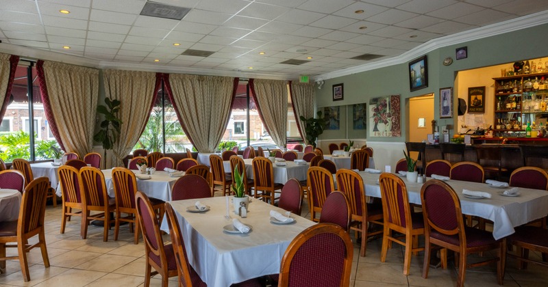 Interior, tables and chairs ready for guests