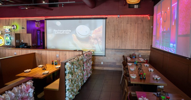 Interior, seating area, projector screen canvases on the right and in front