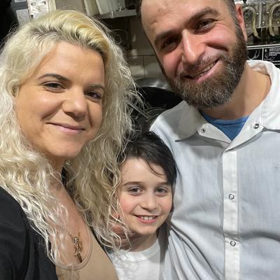Three people taking a selfie together.