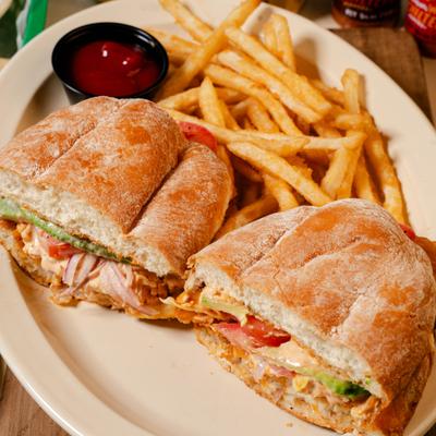 Torta with fish Milanese served woth fries and a dip.