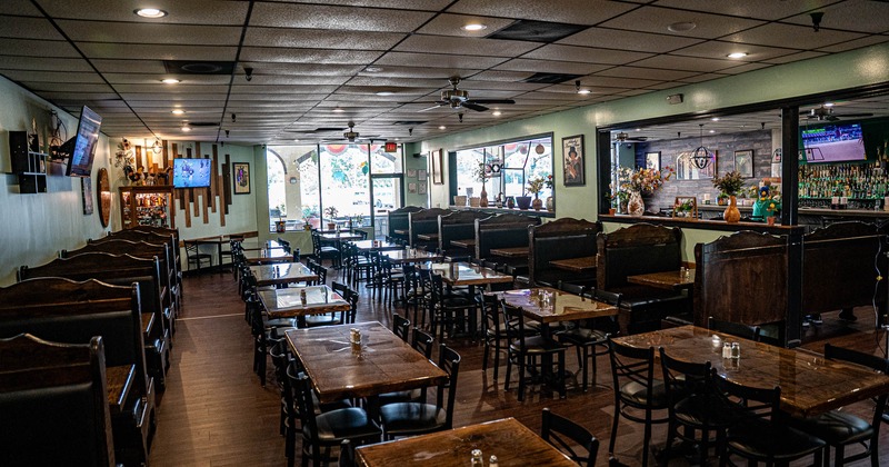 Interior, tables and chairs in dining area