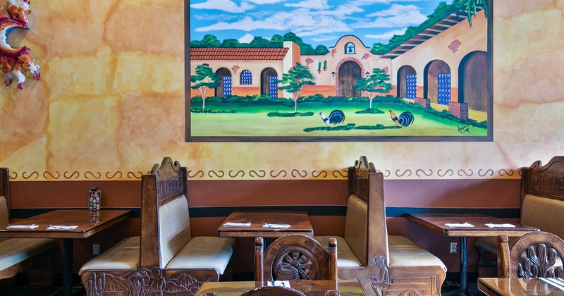 Interior, carved wooden booths, wall painting