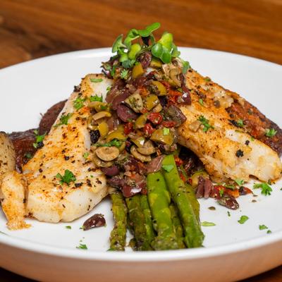 Fish fillet, with sauteed veggies.