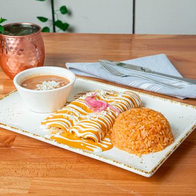 Lobster enchiladas, rice, and beans.