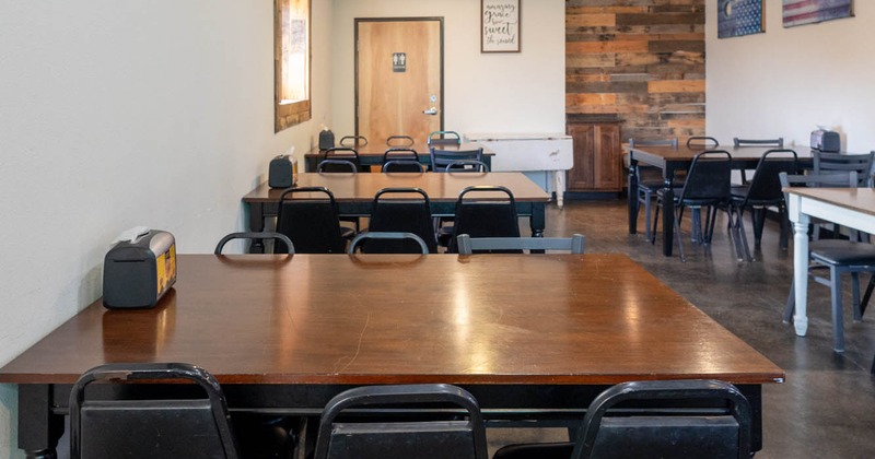 Interior, black leather bench, TV on the wall