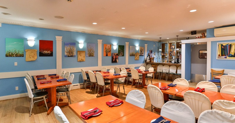 Interior, spacious dining area with tables and chairs