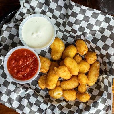 Garlic Cheese Curds with dipping sauces.