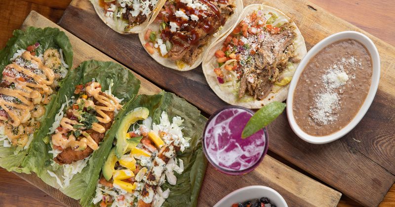 Several taco dishes served, top view