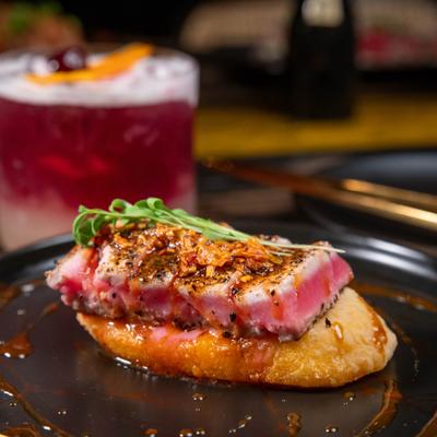 Pepper crusted tuna served.