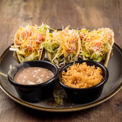 Cheese quesadilla served with rice and beans.