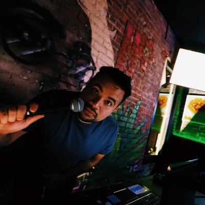 Interior, DJ holding a microphone