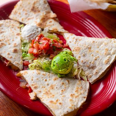 Grilled chicken quesadilla, close up.