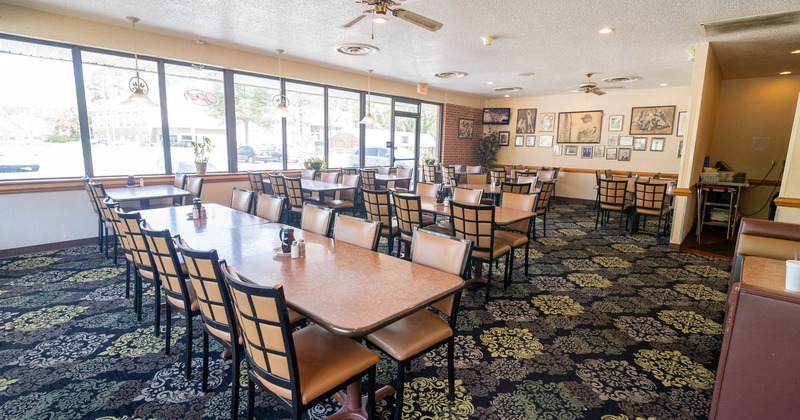 Interior, seating area with tables and chairs