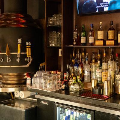 Back bar details, beer taps, spirits.