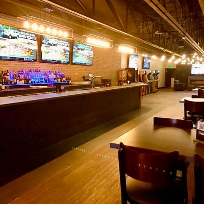 Tables and chairs, the bar area.