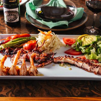 Grilled Seafood Trio plate.