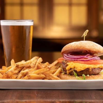 Vegan burger served with beer