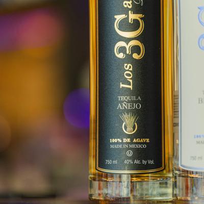 Aged tequila bottle.