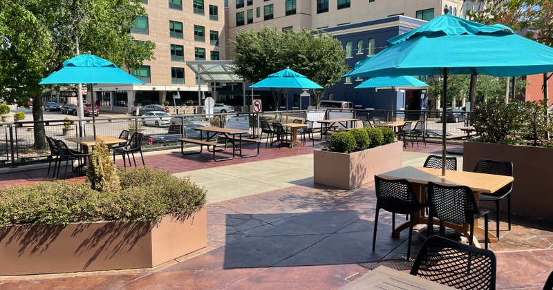 Tables with parasols in patio area