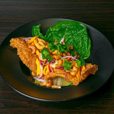 Deep fried fish fillet, topped with mango, red onion, cashews, and spicy lime sauce.