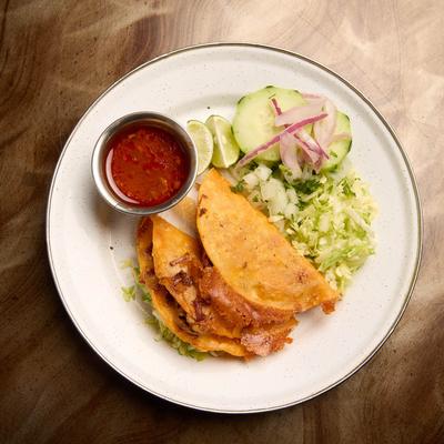 Birria tacos and salad.