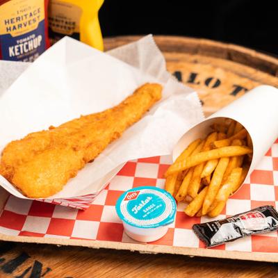 Fried cod with fries and dipping sauce.