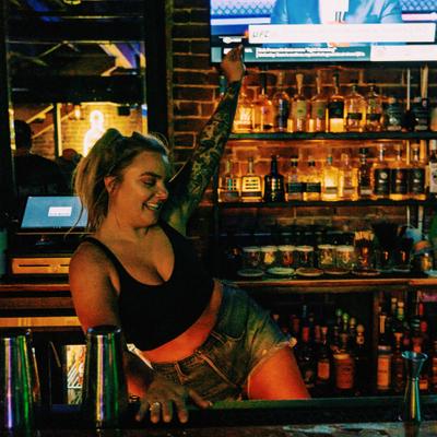 Interior, staff member at the bar