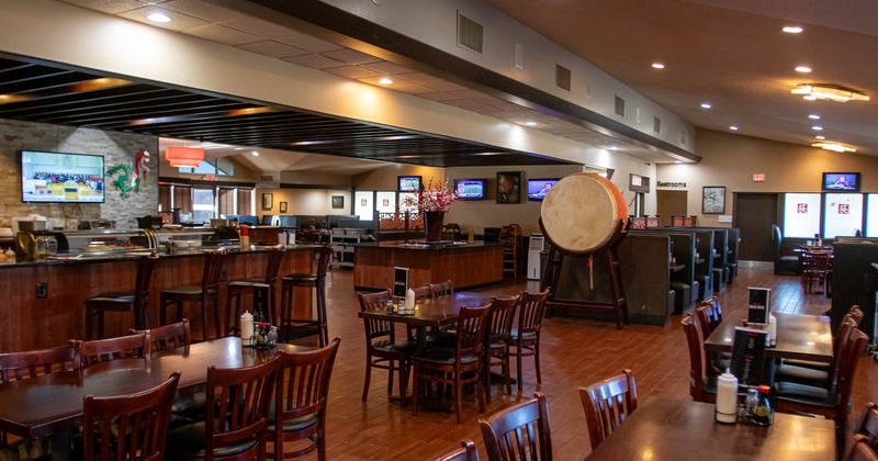 Interior, dining area, tables and chairs ready for guests