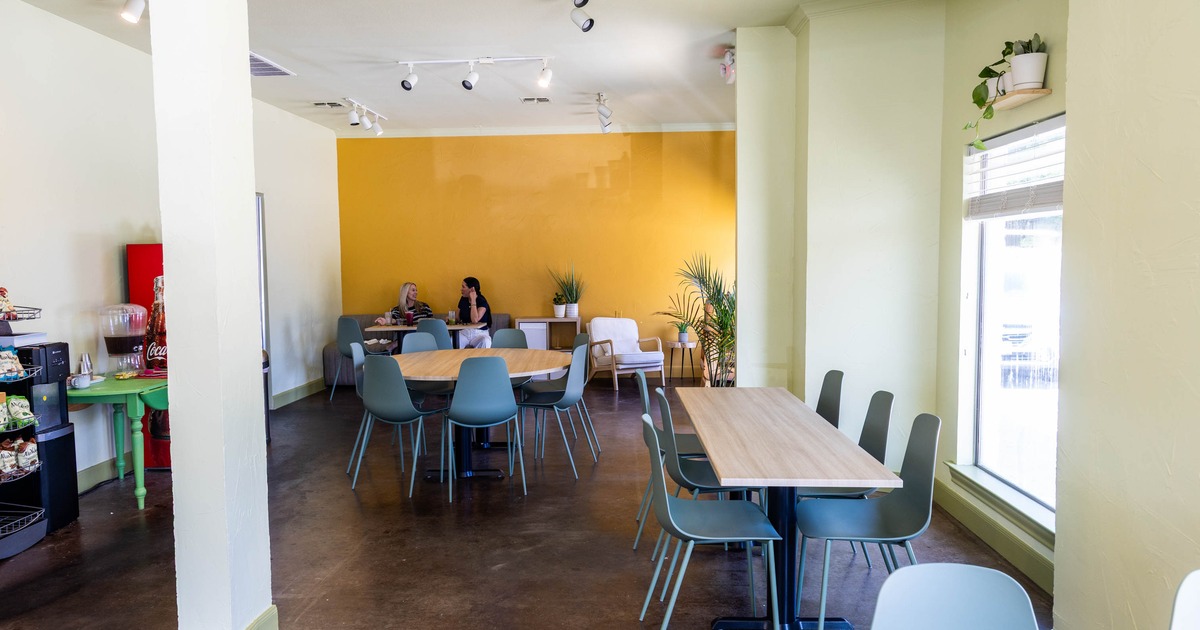 Interior, tables and chairs ready for guests