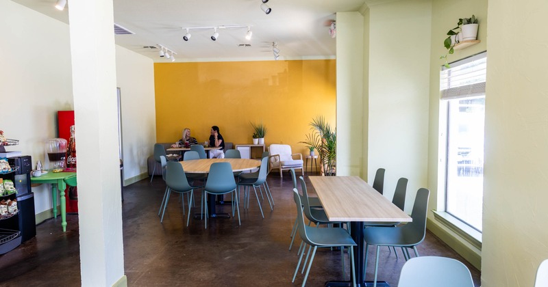 Interior, tables and chairs ready for guests