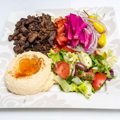 Beef Shawarma, with hummus, salad, and pickled veggies.