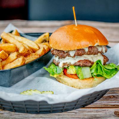 The Juicy Lucy burger served with fries.