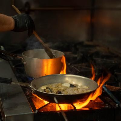 Pot and pan on the stove.