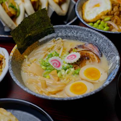 Pork belly ramen in chicken bone broth, with boiled egg, scallions, and fish cakes.