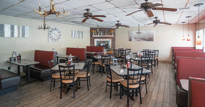 Inside space, dining tables ready for guests