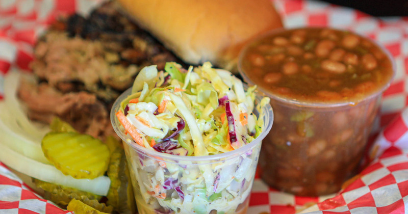 Coleslaw and beans in the plastic cups