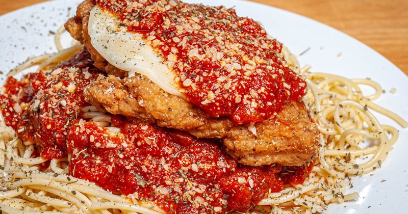 Chicken Parmesan - spaghetti, marinara, breaded chicken, melted cheese, parmesan cheese.