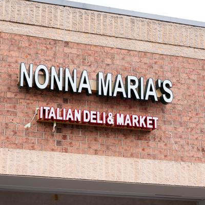 Exterior of Nonna Maria's Italian Deli and Market, name sign on the building.