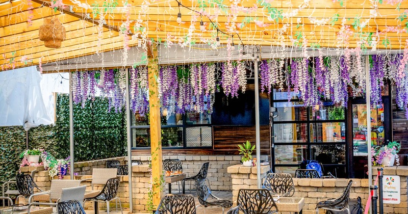 Exterior, patio, tables and chairs ready for guests ,Cambridge , MA