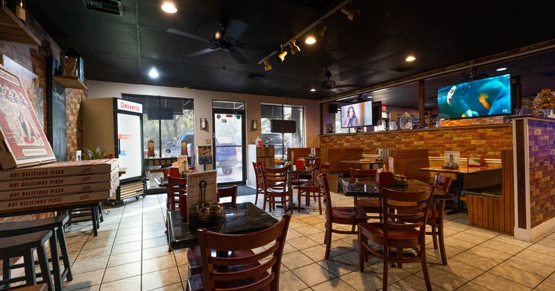 Interior, seating area with tables and chairs